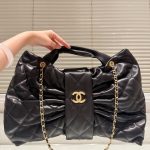 Chanel Maxi Bow Bag Shiny And Gold Tone Metal Black 51Cm - Image 4
