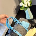 Louis Vuitton Keepall Bandoulière 25 Monogram Eclipse Reverse Coated Canvas Turquoise 25cm M11645 - Image 4