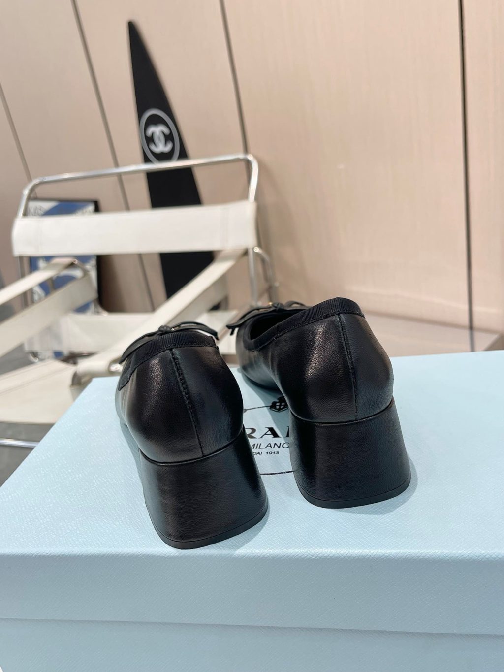 Prada Triangle Logo Bow Pump In Black - Image 4