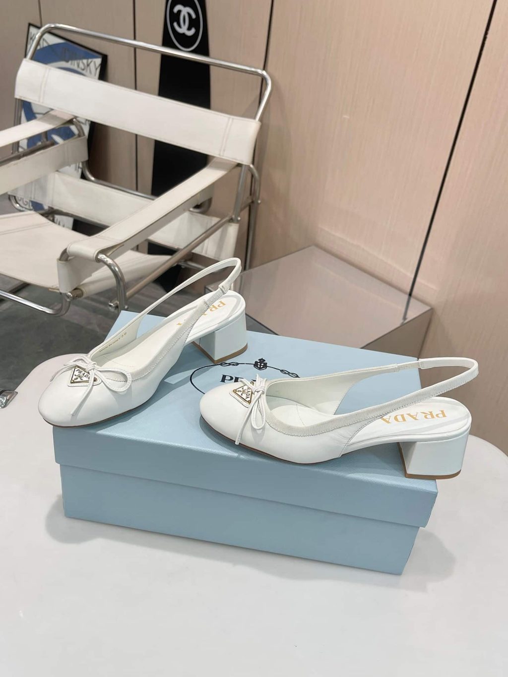 Prada Triangle Logo Bow Slingback Pump In White - Image 7