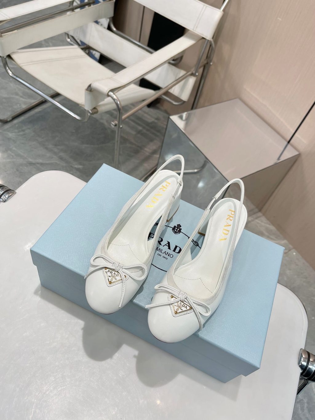 Prada Triangle Logo Bow Slingback Pump In White - Image 4