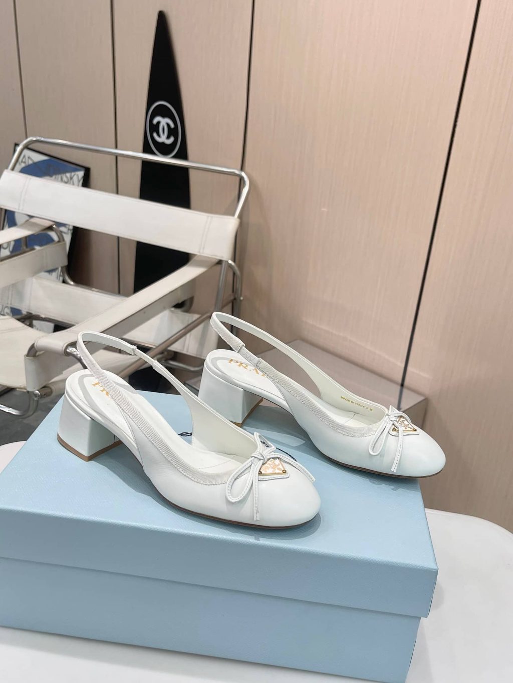 Prada Triangle Logo Bow Slingback Pump In White - Image 3